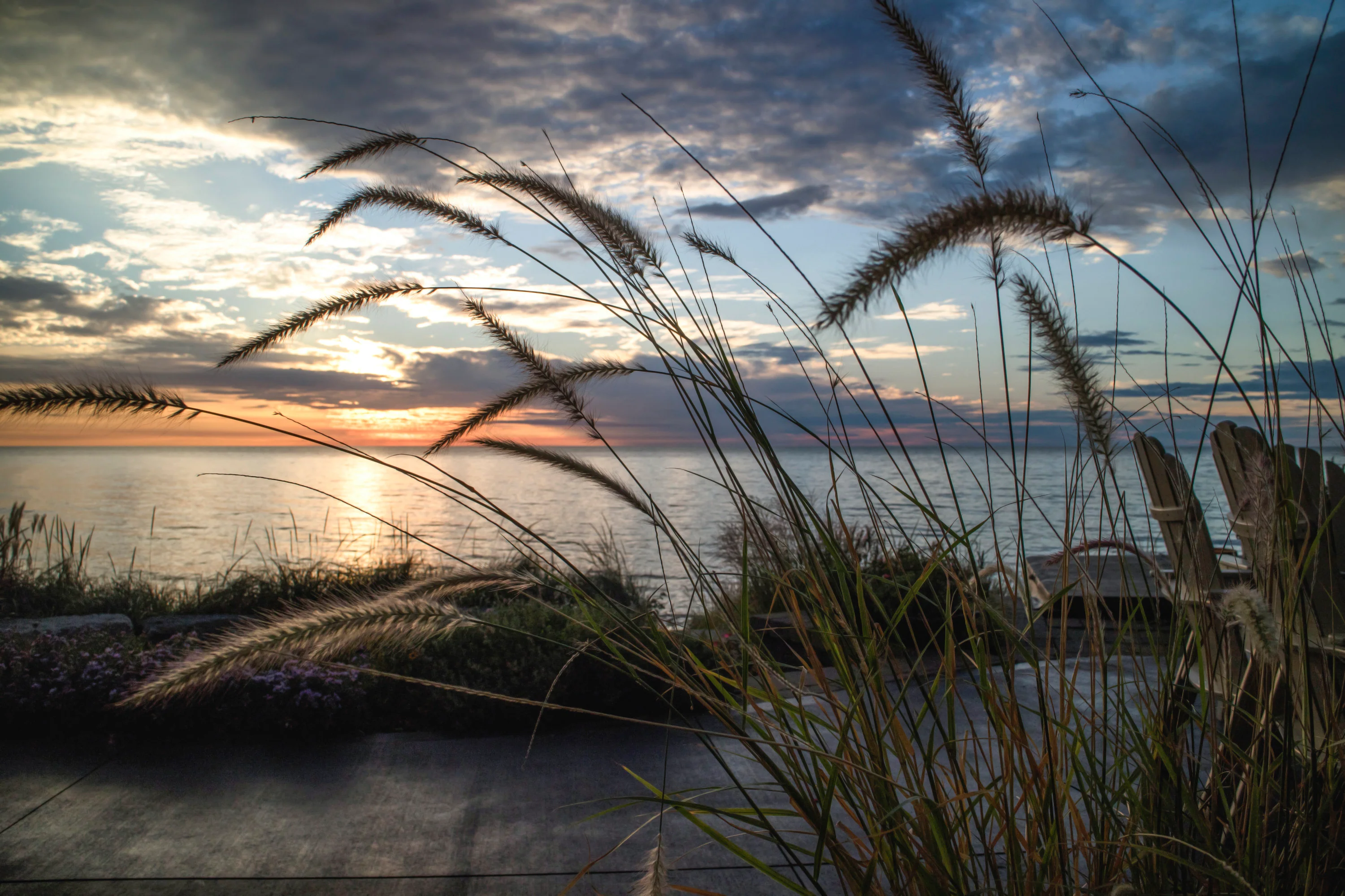 Vineyard Curveback Adirondack 9-Piece Nautical Trestle Dining Set - Image 7